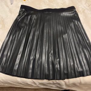 Black faux leather mini skirt